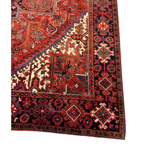 75 - FINE PERSIAN HERIZ CARPET, 327cm x 258cm.