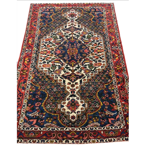 92 - ANTIQUE PERSIAN BAKTIAR RUG, 207cm x 140cm.