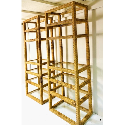 246 - ETAGERES, a pair, 1970's Italian style, rattan with glass shelves, 199cm H x 70cm W x 40cm D. (2)