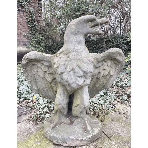 243 - GARDEN STATUE OF AN EAGLE, reconstituted stone in a weathered finish, 81cm H x 75cm W x 46cm D.