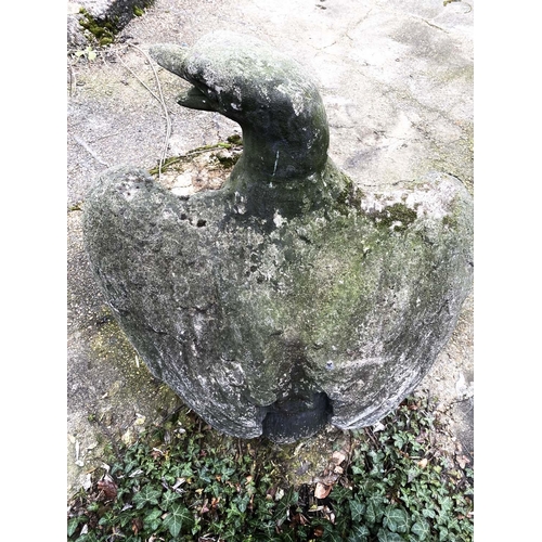 243 - GARDEN STATUE OF AN EAGLE, reconstituted stone in a weathered finish, 81cm H x 75cm W x 46cm D.