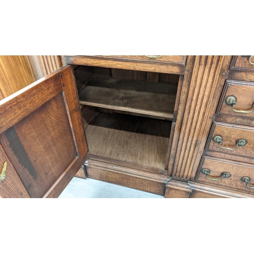 231 - DRESSER, Georgian design oak the plate rack over six drawers and two cupboard doors with square colu... 