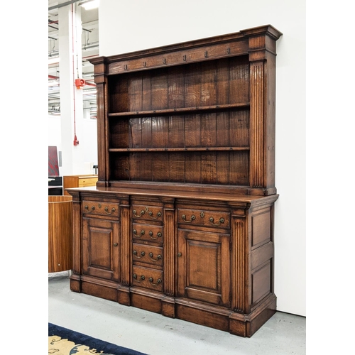 231 - DRESSER, Georgian design oak the plate rack over six drawers and two cupboard doors with square colu... 