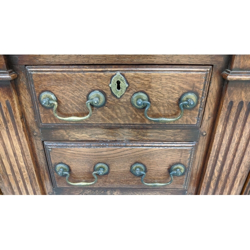 231 - DRESSER, Georgian design oak the plate rack over six drawers and two cupboard doors with square colu... 