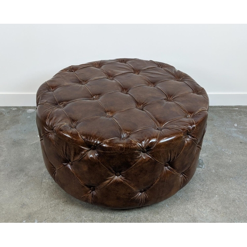 236 - REVOLVING STOOL, circular buttoned brown leather, 50cm H x 100cm D.