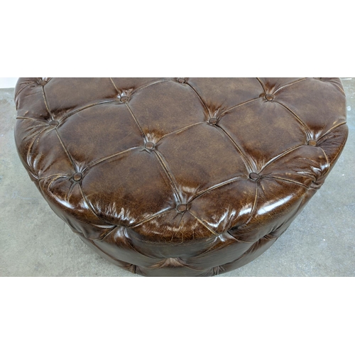 236 - REVOLVING STOOL, circular buttoned brown leather, 50cm H x 100cm D.