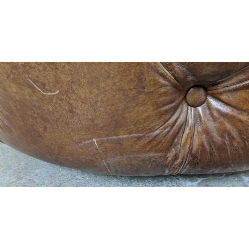 236 - REVOLVING STOOL, circular buttoned brown leather, 50cm H x 100cm D.