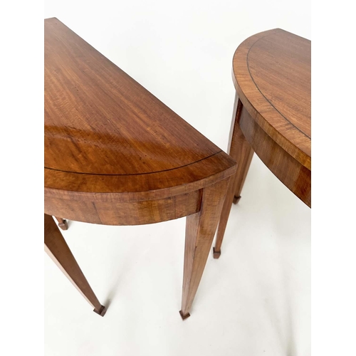 253 - PIER TABLES, a pair, George III design satinwood and crossbanded each demilune with square tapering ... 