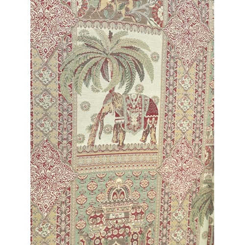 263 - SCREEN, three fold arched 'Raj' fabric, upholstered with elephants and palm trees and brass studded,... 