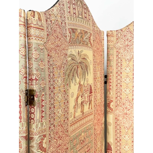 263 - SCREEN, three fold arched 'Raj' fabric, upholstered with elephants and palm trees and brass studded,... 