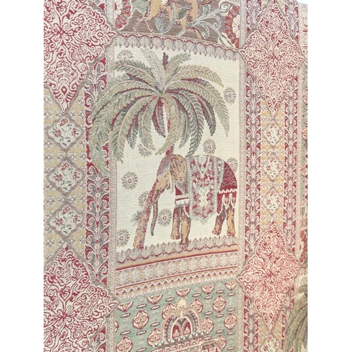 263 - SCREEN, three fold arched 'Raj' fabric, upholstered with elephants and palm trees and brass studded,... 