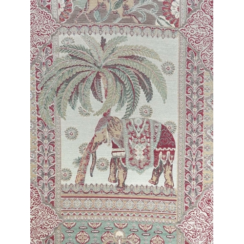 263 - SCREEN, three fold arched 'Raj' fabric, upholstered with elephants and palm trees and brass studded,... 