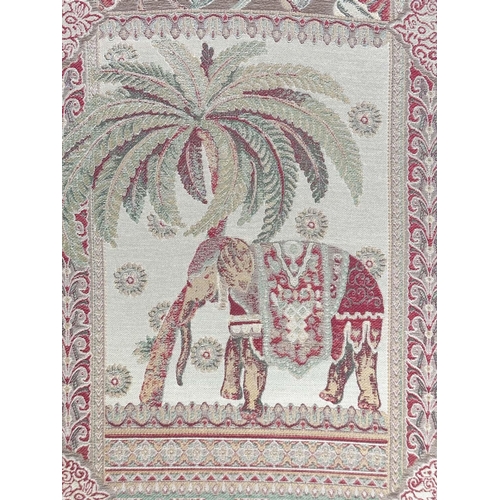 263 - SCREEN, three fold arched 'Raj' fabric, upholstered with elephants and palm trees and brass studded,... 