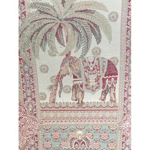 263 - SCREEN, three fold arched 'Raj' fabric, upholstered with elephants and palm trees and brass studded,... 