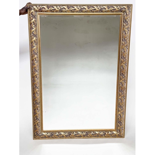 266 - WALL MIRROR, rectangular gilt composition with pierced foliate frame, 176cm H x 114cm.