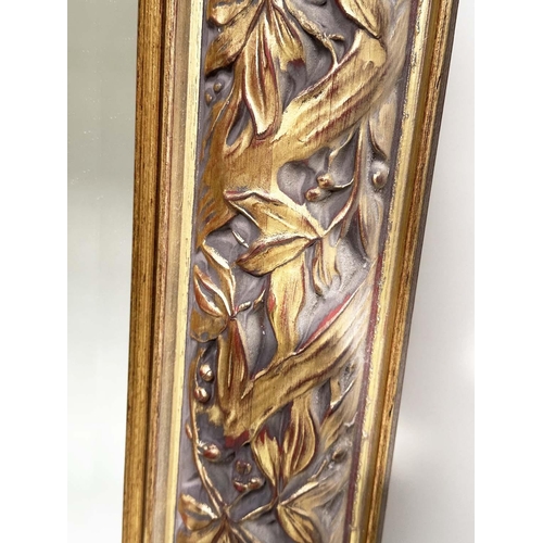 266 - WALL MIRROR, rectangular gilt composition with pierced foliate frame, 176cm H x 114cm.