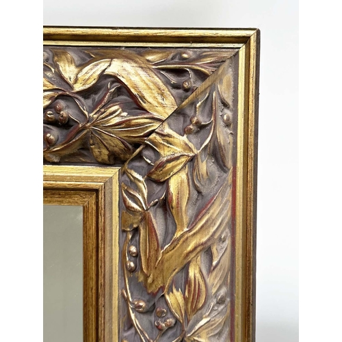 266 - WALL MIRROR, rectangular gilt composition with pierced foliate frame, 176cm H x 114cm.