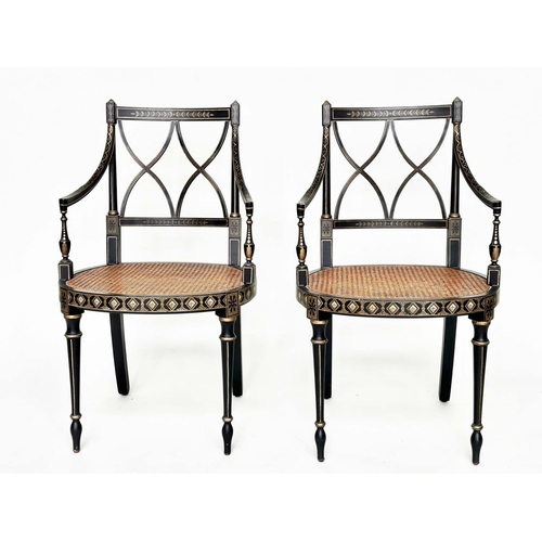 270 - ARMCHAIRS, a pair, Regency style black lacquered and gilt painted with lattice backs and cane seats,... 