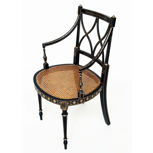 270 - ARMCHAIRS, a pair, Regency style black lacquered and gilt painted with lattice backs and cane seats,... 