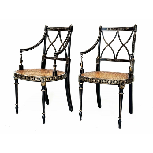 270 - ARMCHAIRS, a pair, Regency style black lacquered and gilt painted with lattice backs and cane seats,... 