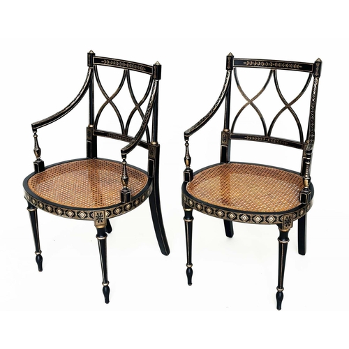 270 - ARMCHAIRS, a pair, Regency style black lacquered and gilt painted with lattice backs and cane seats,... 