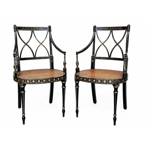 270 - ARMCHAIRS, a pair, Regency style black lacquered and gilt painted with lattice backs and cane seats,... 