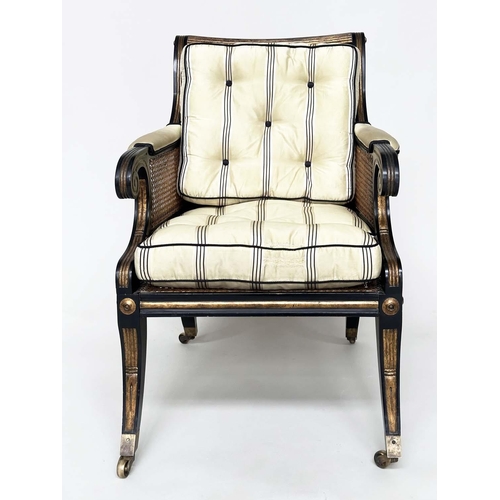 272 - LIBRARY BERGERE BY JULIAN CHICHESTER, Regency style ebonised, gilt heightened and caned, 58cm W.