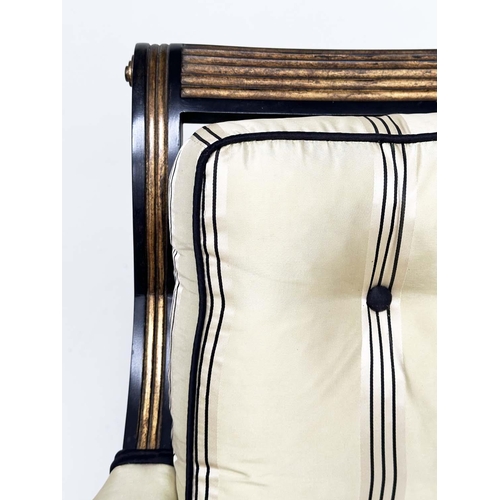 272 - LIBRARY BERGERE BY JULIAN CHICHESTER, Regency style ebonised, gilt heightened and caned, 58cm W.