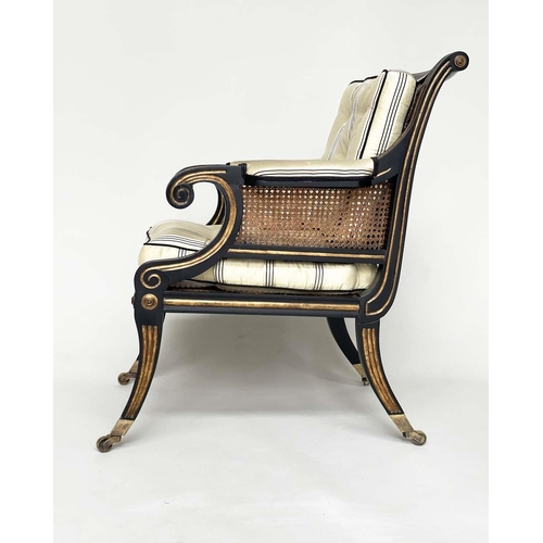 272 - LIBRARY BERGERE BY JULIAN CHICHESTER, Regency style ebonised, gilt heightened and caned, 58cm W.