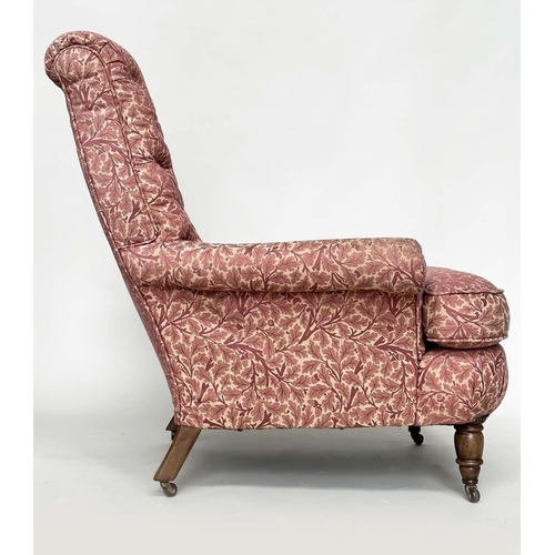 275 - HOWARD STYLE ARMCHAIR, with button back, scroll arms, feather cushion and turned front supports and ... 