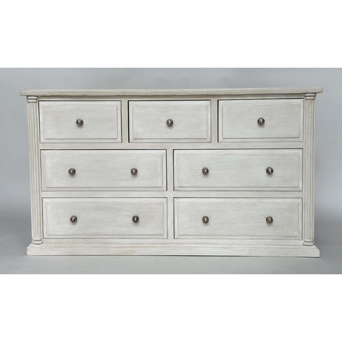 290 - LOW CHEST, Gothic design traditionally grey painted with seven drawers, 140cm W x 43cm D x 79cm H.