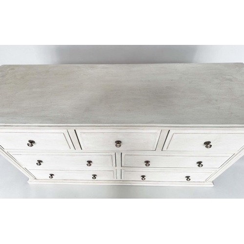 290 - LOW CHEST, Gothic design traditionally grey painted with seven drawers, 140cm W x 43cm D x 79cm H.