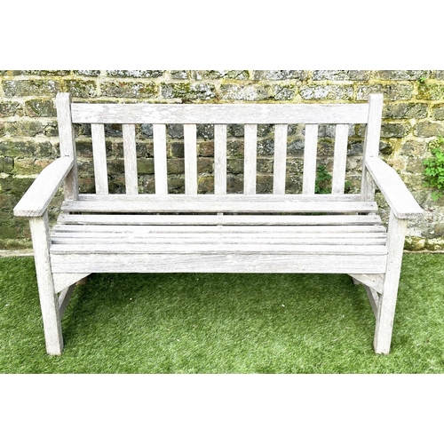 397 - GARDEN BENCH, silvery weathered teak of slatted construction, 130cm W, by 'Lister'.