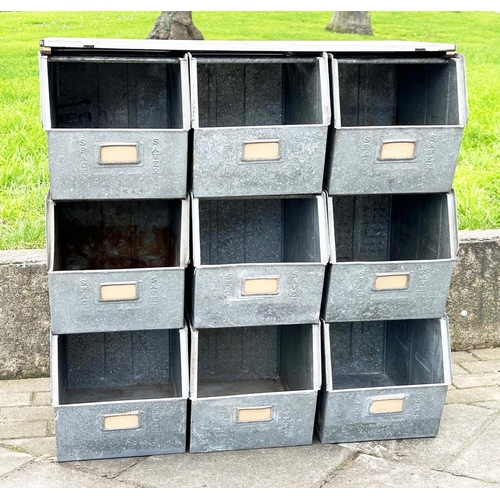 398 - STACKING TRAYS, a set of nine, galvanised with softwood work top, 90cm x 50cm x 91cm H.