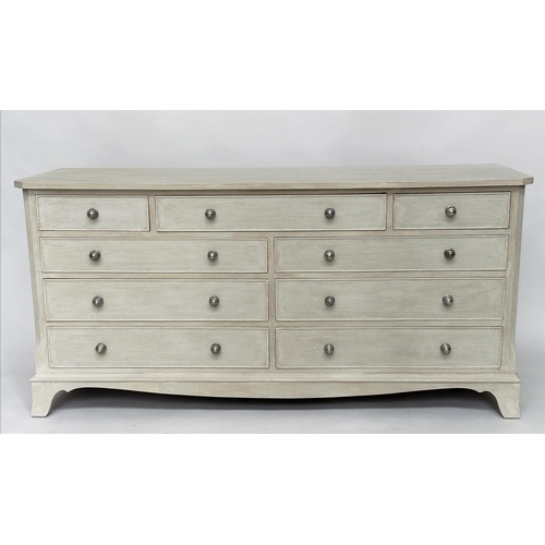 296 - LOW CHEST, Georgian style traditionally grey painted with nine drawers, canted angles and bracket su... 