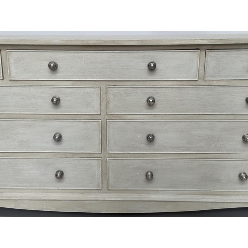 296 - LOW CHEST, Georgian style traditionally grey painted with nine drawers, canted angles and bracket su... 