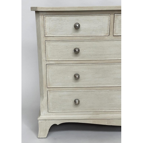 296 - LOW CHEST, Georgian style traditionally grey painted with nine drawers, canted angles and bracket su... 