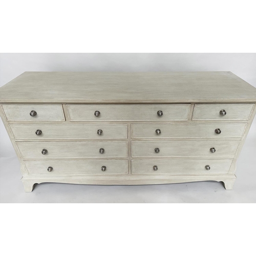 296 - LOW CHEST, Georgian style traditionally grey painted with nine drawers, canted angles and bracket su... 