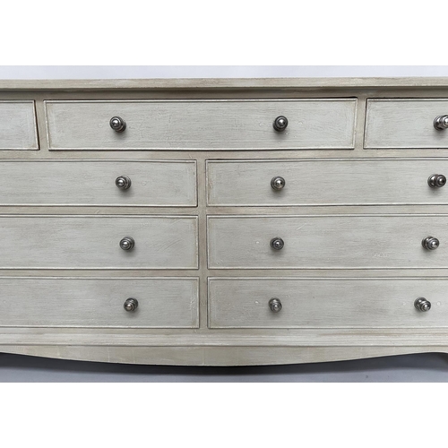 296 - LOW CHEST, Georgian style traditionally grey painted with nine drawers, canted angles and bracket su... 