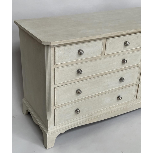 296 - LOW CHEST, Georgian style traditionally grey painted with nine drawers, canted angles and bracket su... 