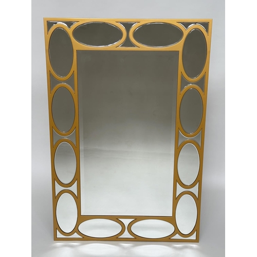 402 - WALL MIRROR, rectangular gilt with oval panelled marginal plates and bevelled mirror throughout, 80c... 