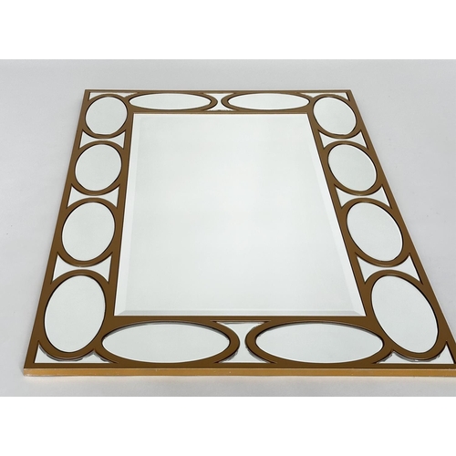 402 - WALL MIRROR, rectangular gilt with oval panelled marginal plates and bevelled mirror throughout, 80c... 