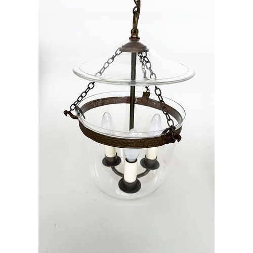 405 - HALL LANTERNS, a pair, glass and bronzed metal each with three lights, 40cm H x 23cm. (2)