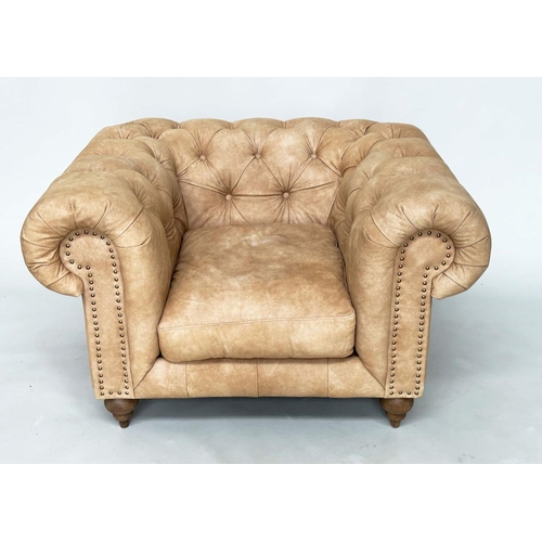 425 - CHESTERFIELD ARMCHAIR, deep buttoned nubuck light tan leather with turned supports, 116cm x 73cm H.