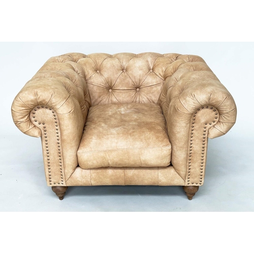 425 - CHESTERFIELD ARMCHAIR, deep buttoned nubuck light tan leather with turned supports, 116cm x 73cm H.