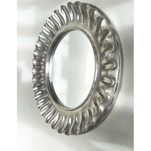 429 - WALL MIRROR, large circular wavy silvered frame, 112cm W.