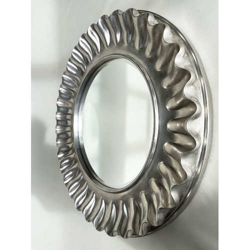 429 - WALL MIRROR, large circular wavy silvered frame, 112cm W.