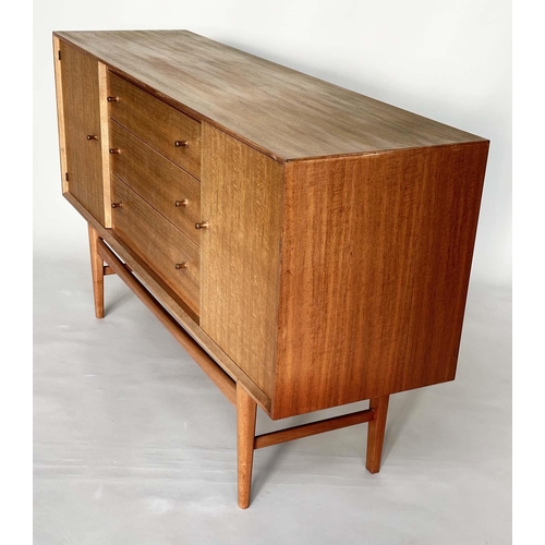 438 - GORDON RUSSELL SIDEBOARD, mid 20th century teak, with three drawers flanked by cupboards stamped to ... 