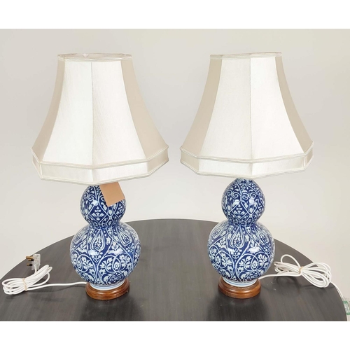 319 - LAUREN RALPH LAUREN HOME TABLE LAMPS, a pair, blue and white double gourd ceramic, with shades, 72cm... 