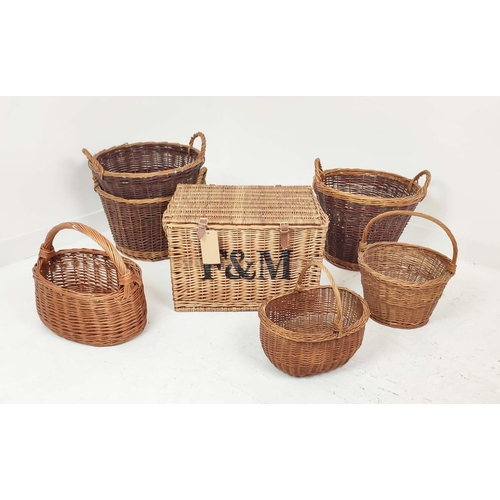 320 - BASKETS, a set of seven, wicker in various sizes, to include a picnic hamper, 40cm H x 60cm x 40cm D... 